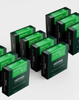 Ten boxes of Hedoniq Essential Box specialty instant coffee, neatly displayed in rows on a light background.