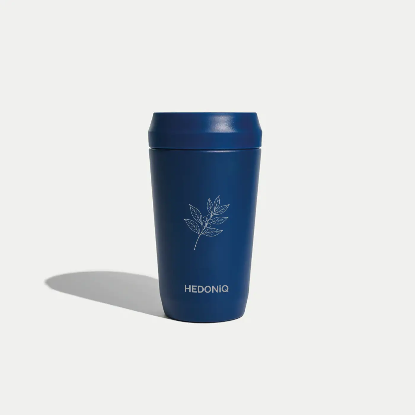 Hedoniq navy reusable travel cup with minimalist coffee branch design.